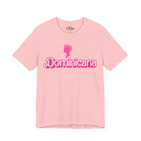 Thumbnail for Bright Pink Bella + Canvas 3001  t-shirt with a bold pink Barbie Style Font with the word 'Dominicana' text across the chest, featuring a Barbie style silhouette of a woman's head in hair curlers above the text, designed in a vibrant and playful style.