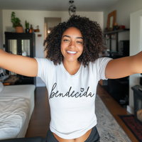 Thumbnail for Beautiful Dominican woman smiling wearing an oversized Bella Canvas 3001 graphic tshirt with the words 