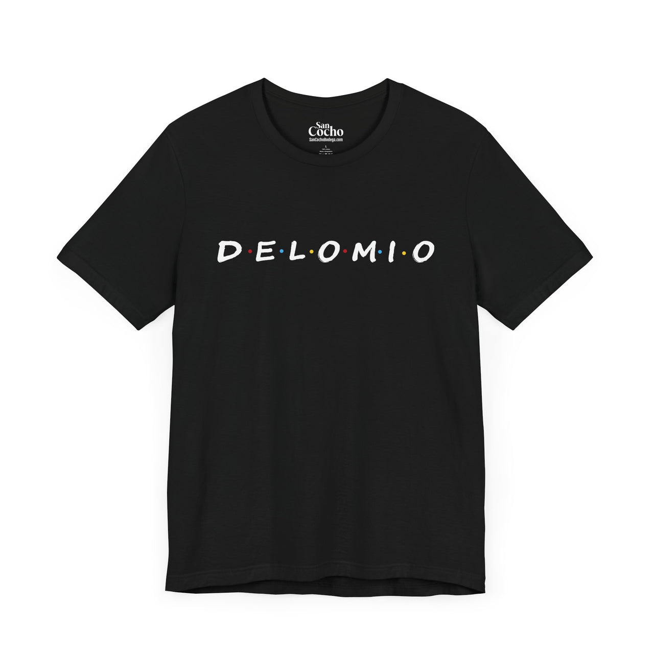 A black flat lay mockup of a graphic Bella Canvas 3001 graphic tshirt with the words "De Lo Mio" a Parady of the Friends TV Show font