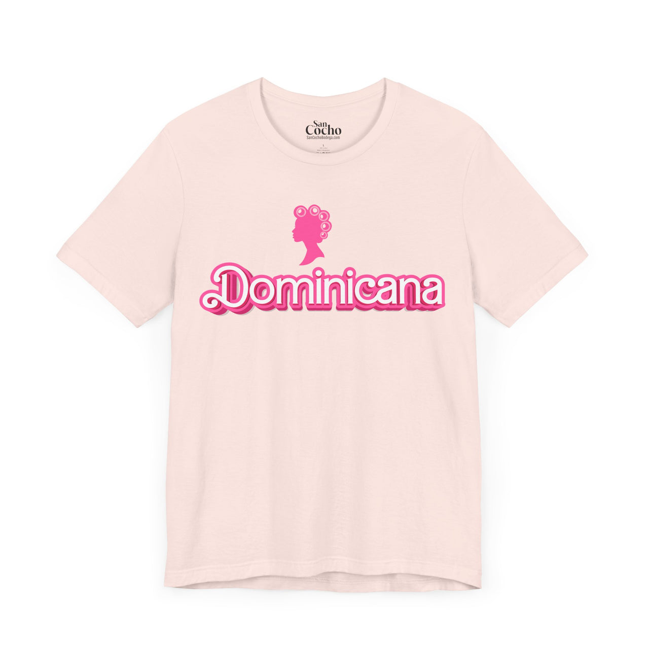 Light Pink Bella Canvas 3001 graphic tshirt with a Barbie con Rollos graphic and the words "Dominicana" on it