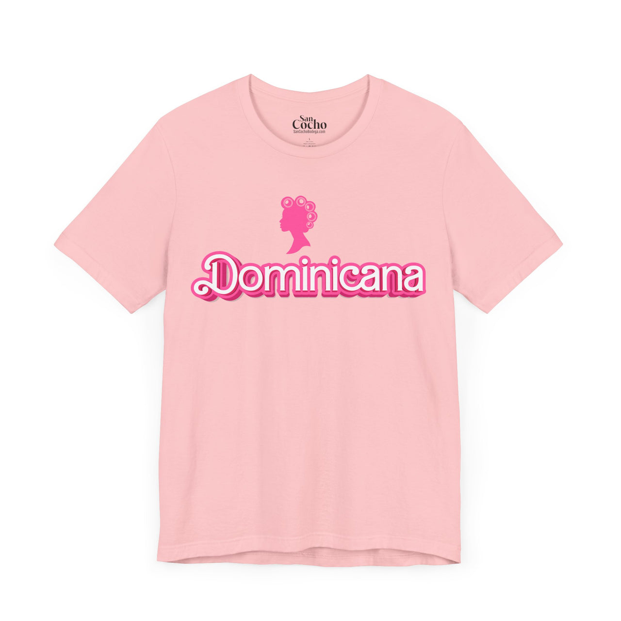 Pink Bella Canvas 3001 graphic tshirt with a Barbie con Rollos graphic and the words "Dominicana" on it