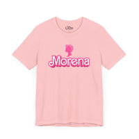 Thumbnail for Pink Bella Canvas 3001 graphic tshirt flat lay with a Barbie con Rollos graphic and the words 