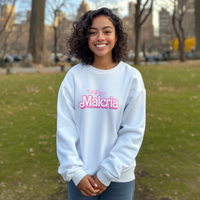 Thumbnail for Pretty Dominican girl smiling wearing an oversized Gildan 18000 graphic crew neck sweatshirt with the words 