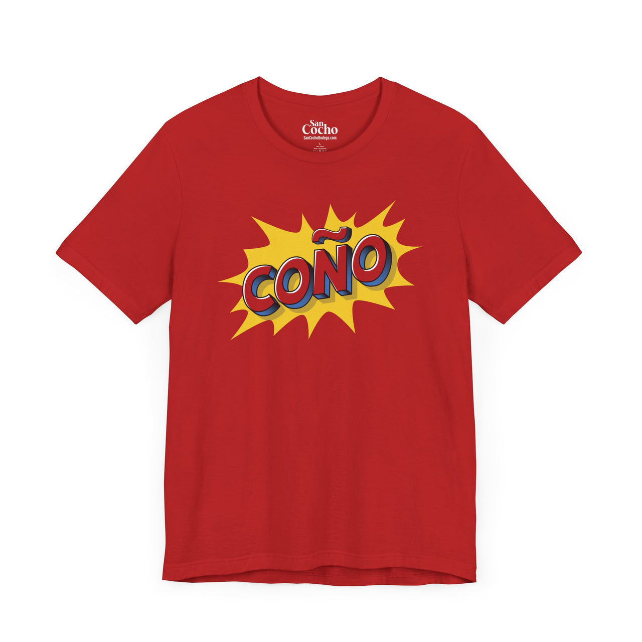 A red flat lay mockup of a graphic Bella Canvas 3001 graphic tshirt in comic book style with the words "Coño" on the front