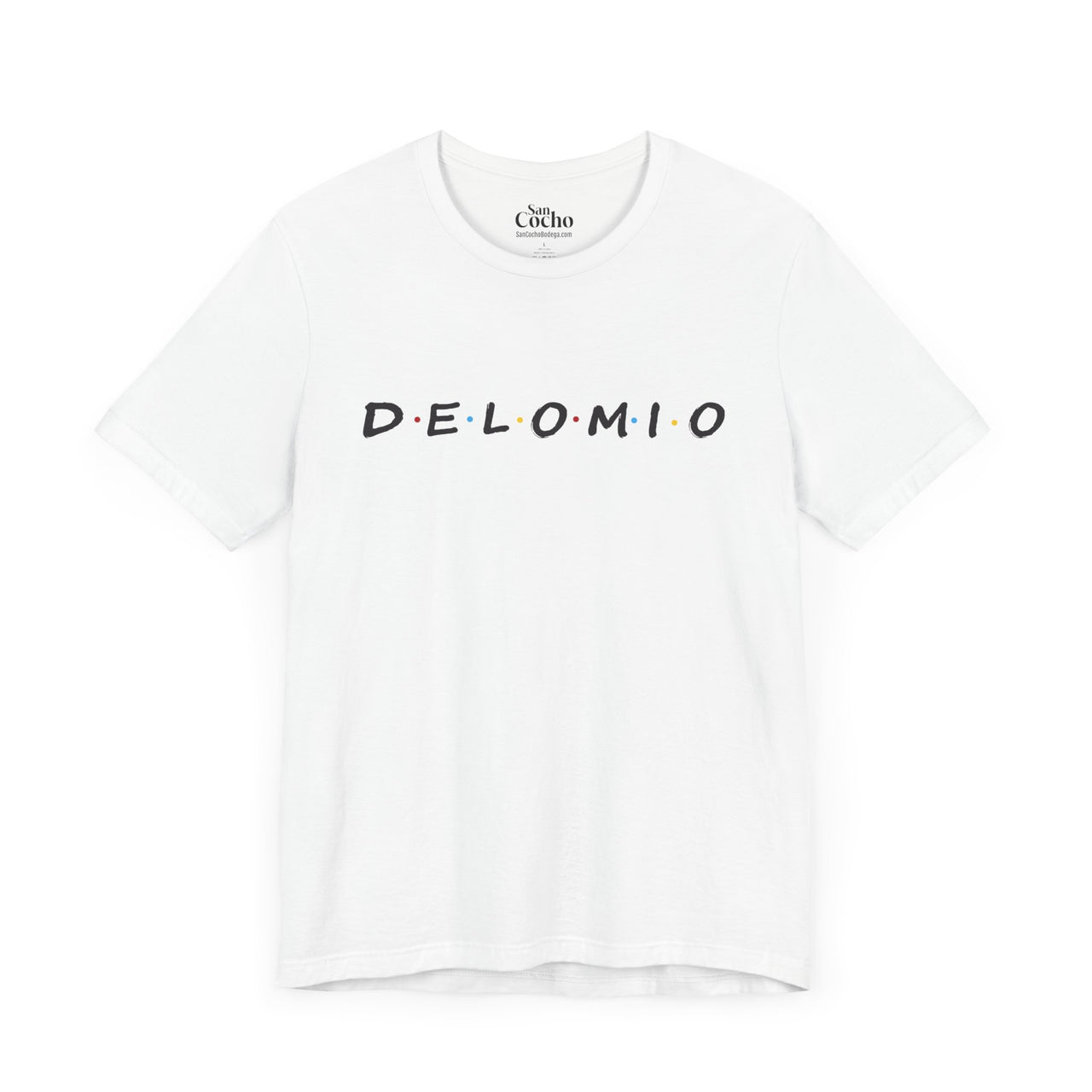 A white flat lay mockup of a graphic Bella Canvas 3001 graphic tshirt with the words "De Lo Mio" a Parady of the Friends TV Show font